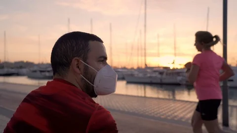 New normal: slow motion video of a spanish man wearing a protection mask on P Video stock 129616186