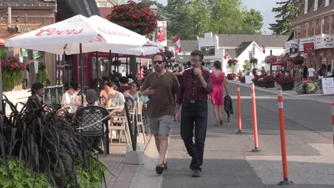 New normal  small town main street Canada with people wearing COVID face masks 스톡 동영상 156375196