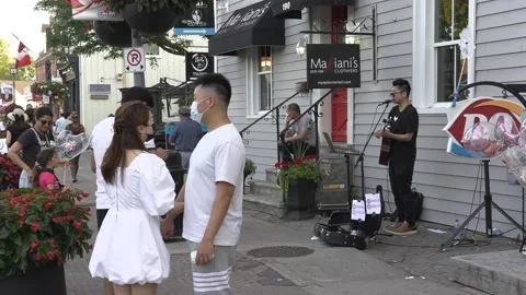 New normal  small town main street Canada with people wearing face masks Stock-Footage 156390840