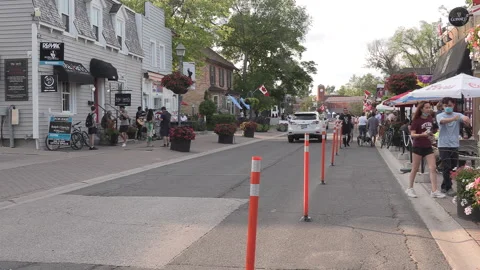 New normal  small town main street Canada with people wearing COVID face masks 스톡 동영상 156401827