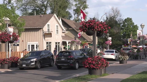 New normal  small town main street Canada with people wearing COVID face masks Видео 156406864