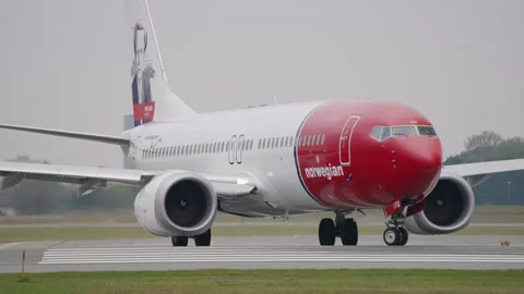 New Norwegian Boeing 737 MAX Passenger Airplane on Runway for Takeoff Copenhagen Stock Footage 286039073