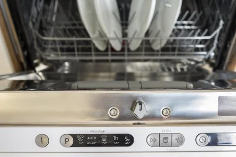 New open dish washer in the kitchen Stock Photos
