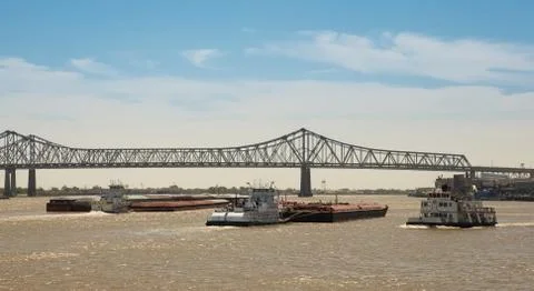 New orleans - barge traffic on mississippi river Stock Photos