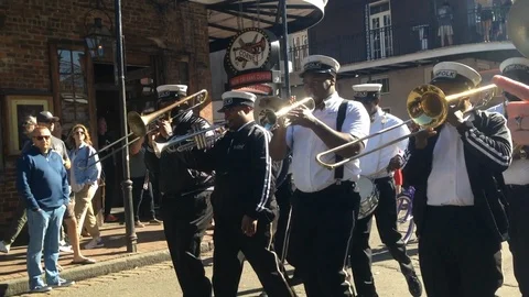 New Orleans Jazz Band Marches Down Bourbon Street French Quarter Stock Footage Stock Footage