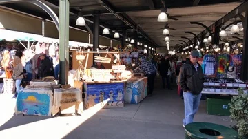New Orleans Medium Tilt Down to French Market Shoppers Stock Footage 85913917