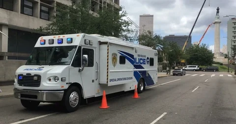 New Orleans Police Car Van during removal of confederate Robert E Lee Statue Stock Footage