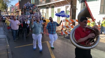 New Orleans Tilt Down to Second Line Parade Stock Footage 85918466
