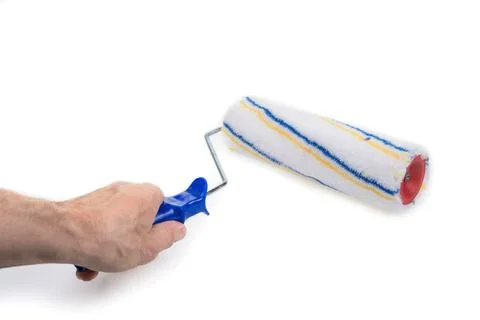 New paint roller with handle on a white Stock Photos