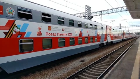 New passenger train stands at the platform at the station Stock Footage 312263464