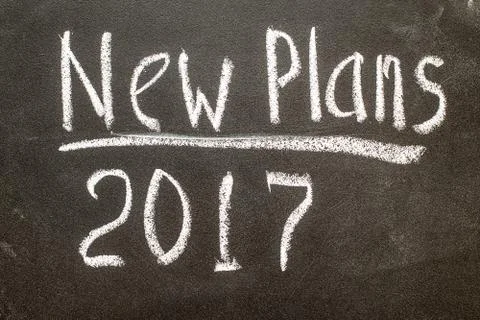 New Plan 2017 handwritten with white chalk on a blackboard Stock Photos