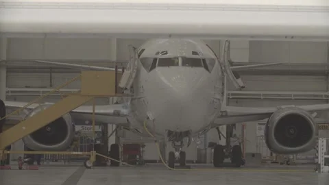 The new plane takes off from the hangar Stock Footage 164473953