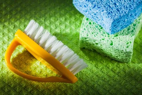 New plastic brushes Kitchen sponge on flannels Stock Photos