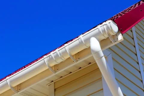 New plastic rain gutter system. Stock Photos