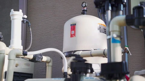 New Pool Pump Equipment - Modern Energy Efficient Pool System Stock Footage 311654746