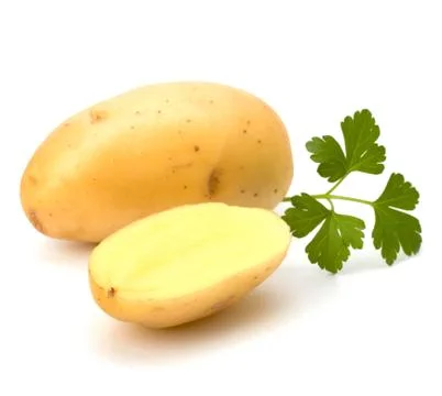 New potato and green parsley Stock Photos