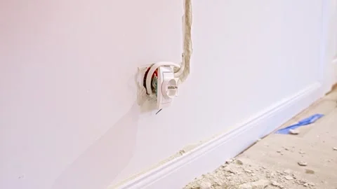 New Power Outlet Socket Installed on Apartment Wall during Renovation Stock Footage 260124228