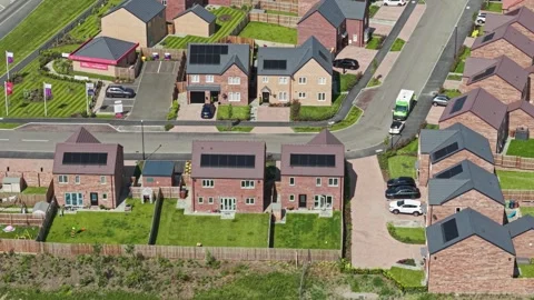New property development houses with embedded solar panels, England Stock Footage 313481410