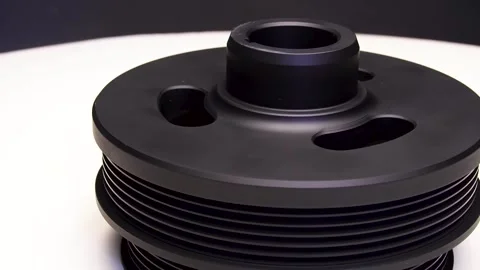 A new pulley for a car on an engine made Stock Footage 252212731