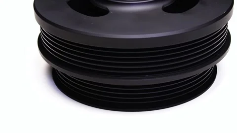 A new pulley for a car on an engine made 스톡 동영상 252212737