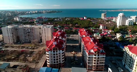 New residential complex of several multi-storey buildings with red roofs Stock Footage 317842259