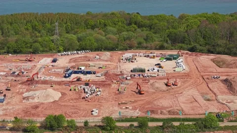 New residential housing development under construction on brownfield land, .. Stock Footage 334799838