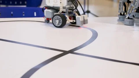 New robot project. Driving over the black tape. Self control with path detector Stock Footage 83184302