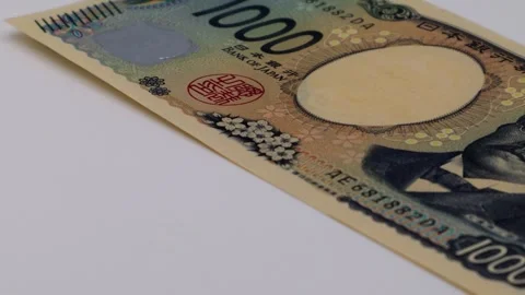 The new rotating 1,000 yen bill Stock Footage 326079596