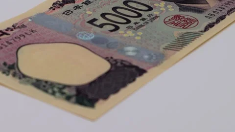 The new rotating 5,000 yen bill Stock Footage 326079230