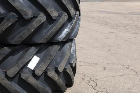 New rubber on the loader, rubber for the tractor. New rubber. Stock Photos