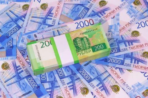 New Russian rubles: a pack of two-ruble banknotes in a Bank package on the ba Stock Photos