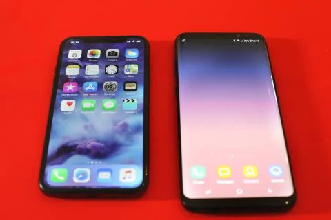 New Samsung S8 plus an Iphone X comparasion Stock Photos