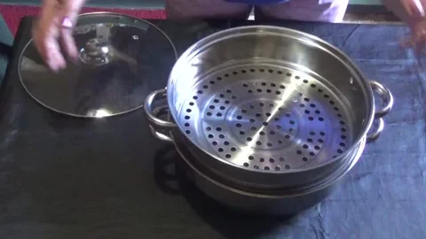 New saucepan for steaming vegetables Video stock 308368421