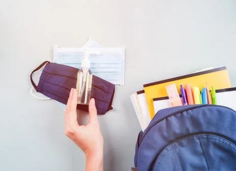 New school set including face mask, sanitizer Stock Photos