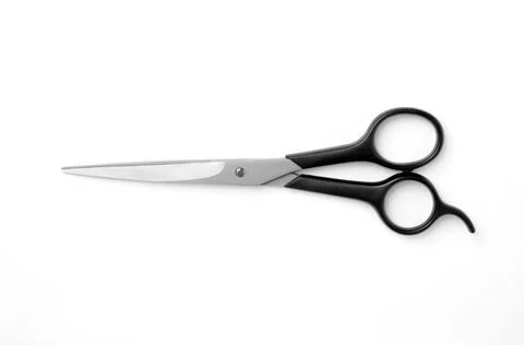 New scissors on white background, top view. Professional hairdresser tool Stock Photos