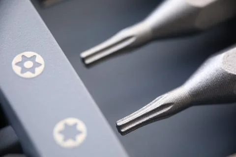 New screwdriver bits for the screwdriver closeup Stock Photos
