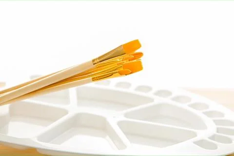 New set of clean brushes of different sizes on a wooden handle, with the oval Stock Photos