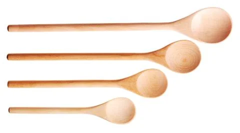 New set spoons of different sizes isolated on white background Stock Photos