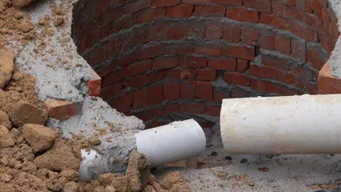 New Sewer Pipeline Installed Beneath Delhi Street During Road Construction Stock Footage 327551612