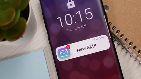 New SMS Message Notification on a Smartphone Screen Stock Footage 122014193