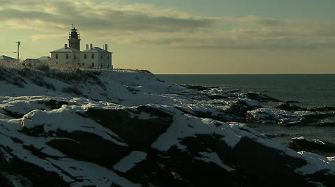 New Snowfall and Lighthouse in early morning light 動画素材 36588234