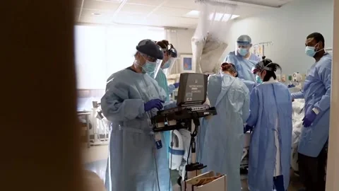 New strains of Delta and Lambda coronavirus. Medics in protective suits (33) Stock Footage 156868975