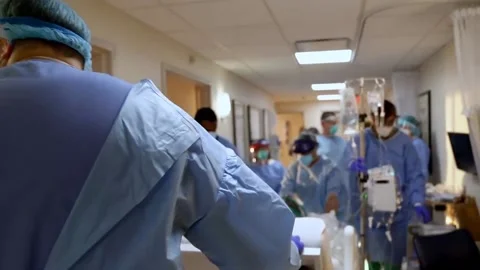 New strains of Delta and Lambda coronavirus. Medics in protective suits (35) Video stock 156868977