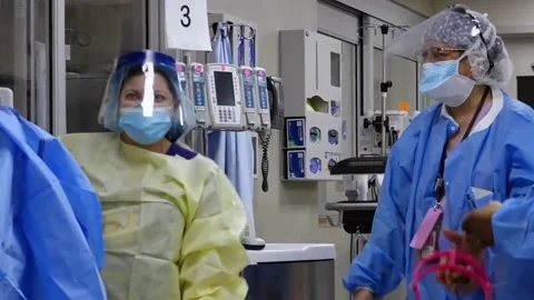New strains of Delta and Lambda coronavirus. Medics in protective suits (32) Video stock 156868978