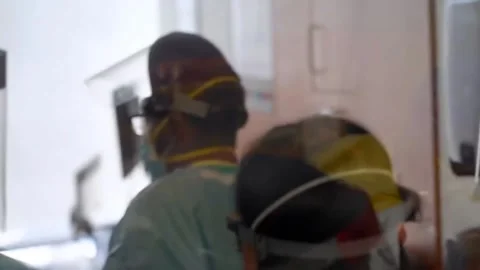 New strains of Delta and Lambda coronavirus. Medics in protective suits (27) Stock Footage 156869020