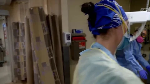 New strains of Delta and Lambda coronavirus. Medics in protective suits (21) Stock Footage 156869052