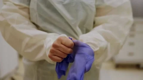 New strains of Delta and Lambda coronavirus. Medics in protective suits (11) Video stock 156869126