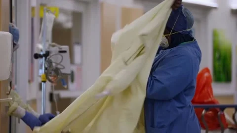 New strains of Delta and Lambda coronavirus. Medics in protective suits (10) Stock Footage 156869132