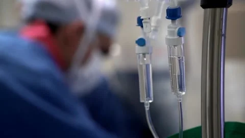New strains of Delta and Lambda coronavirus. Medics in protective suits (8) Stock Footage 156869146