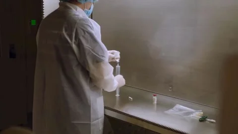 New strains of Delta and Lambda coronavirus. Medics in protective suits (7) Stock Footage 156869148